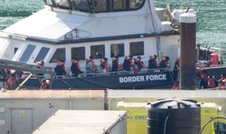 A group of people who think they are immigrants who come to Dover